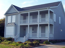 Hatteras Storm Panels installed across a home's windows